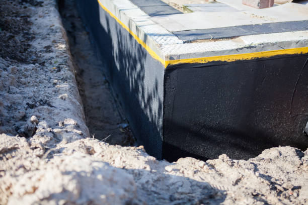 Professional Waterproofing technician working in Abbyville, KS